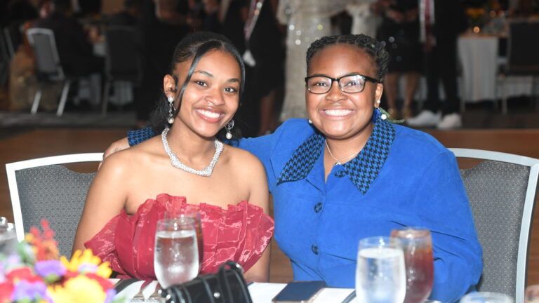Students sitting at reception